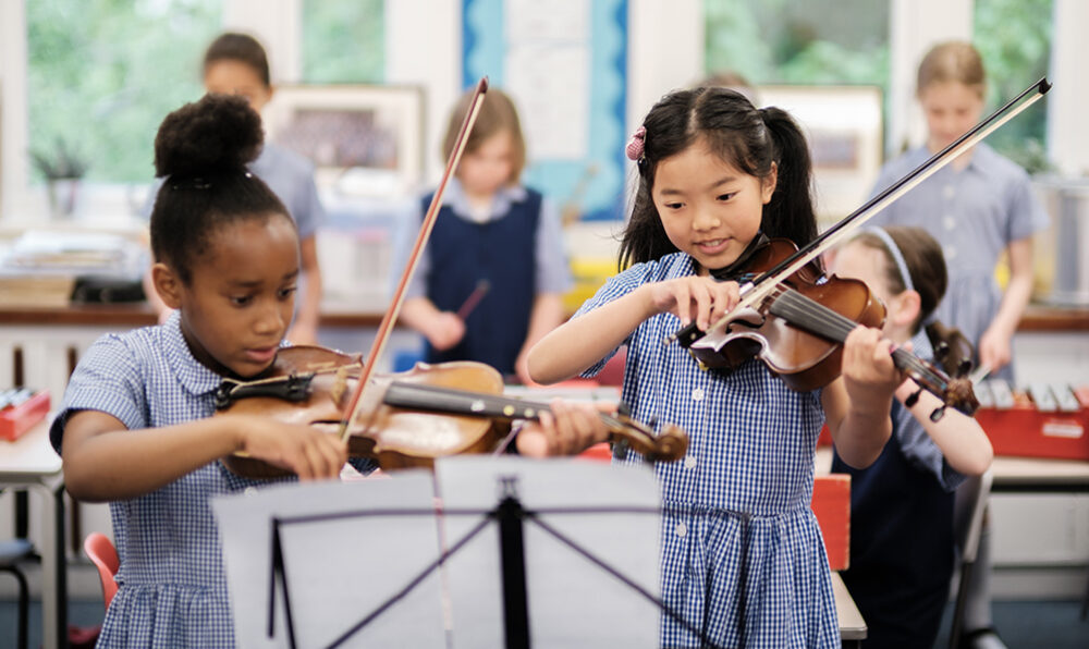 Girls violin music class